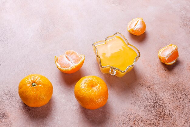 Mandarin cream curd and cookies with fresh mandarins.