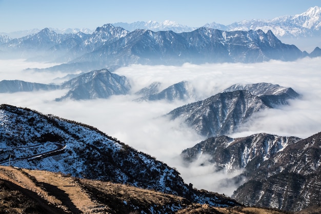 Free photo many clouds covering mountains