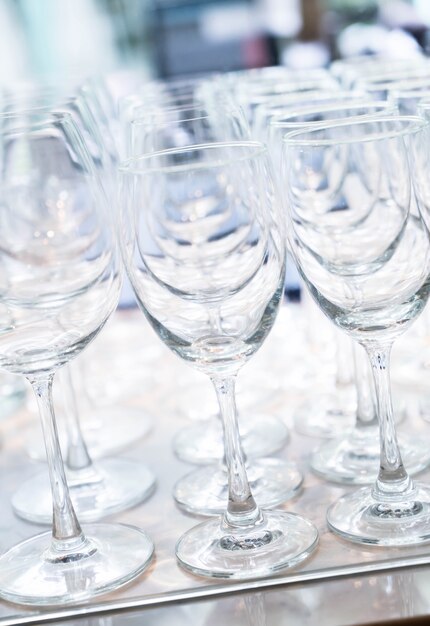 Many empty glasses in a line