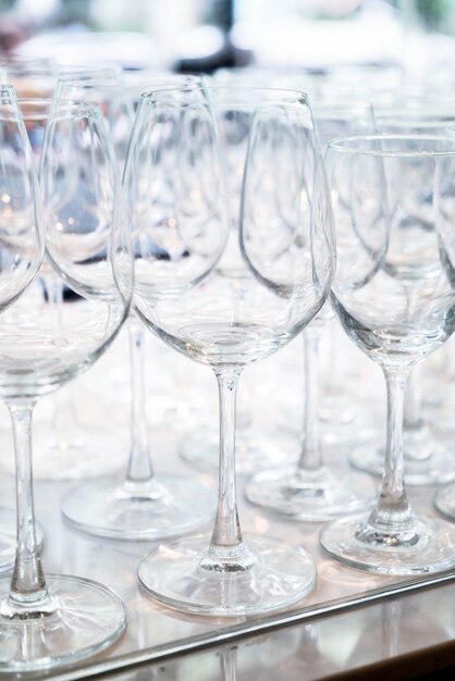 Many empty glasses in a line