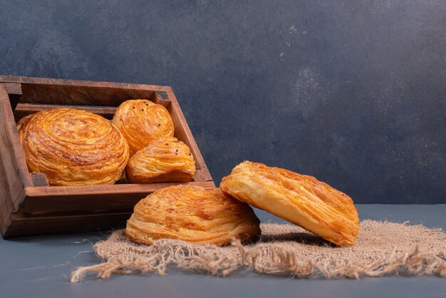 Many of gogals on wooden basket on marbel wall