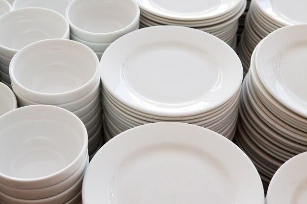 Many plates stacked together