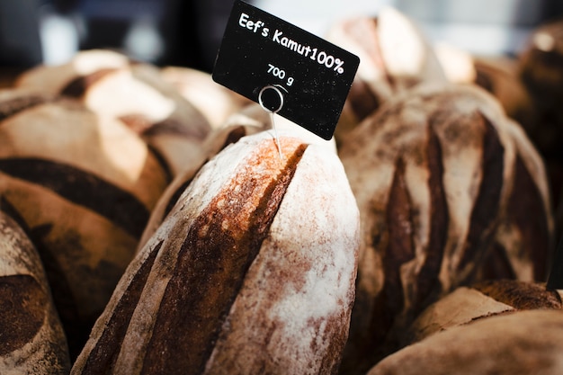 Many rustic baked bread with black tag