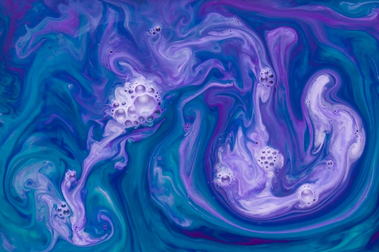 Free Photo marbled green and purple fluid with bubbles abstract background