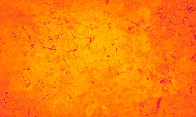 Free photo marbled yellow and orange abstract background