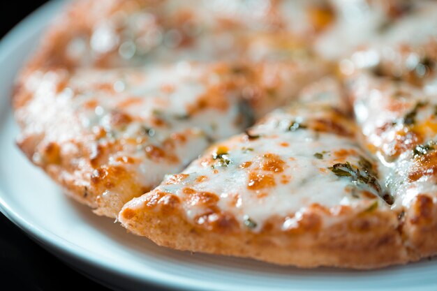 Margarita pizza with mozarella cheese and tomato sauce