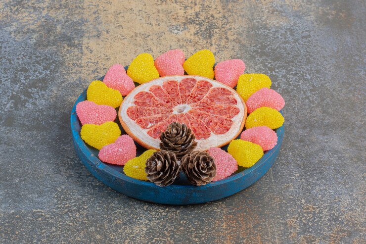 Marmalade with slice of grapefruit and pinecones. High quality photo