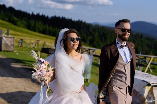 Married couple walking in mountains