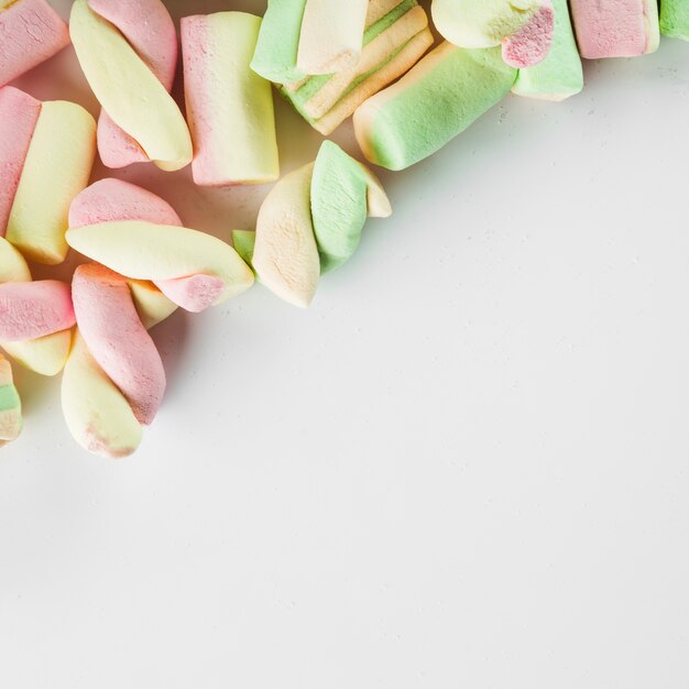 Marshmallow in corner of white background