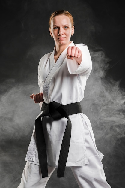 Martial arts fighter posing front view
