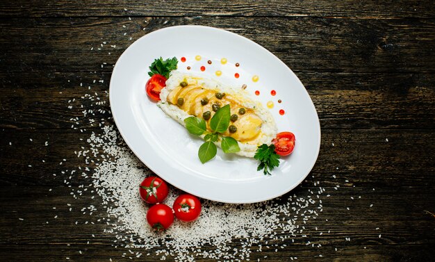 Mashed rice with beans and tomato