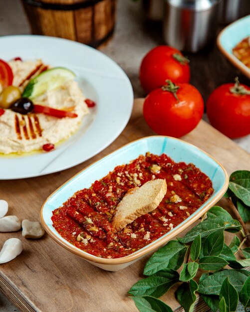 Mashed vegetables with walnuts and cracker