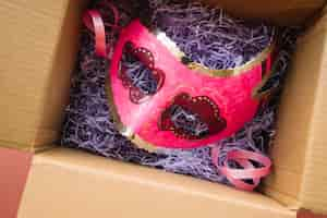 Free photo mask placed in craft box