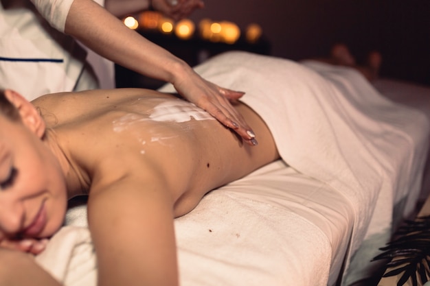 Massage concept with relaxed woman