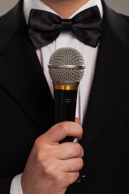 Free photo master of ceremonies with microphone