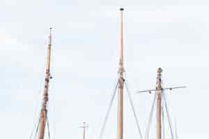 Free photo masts of ships against skys