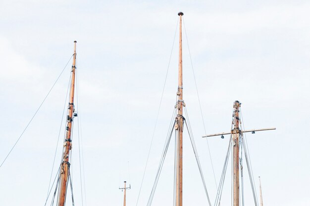 Masts of ships against skys