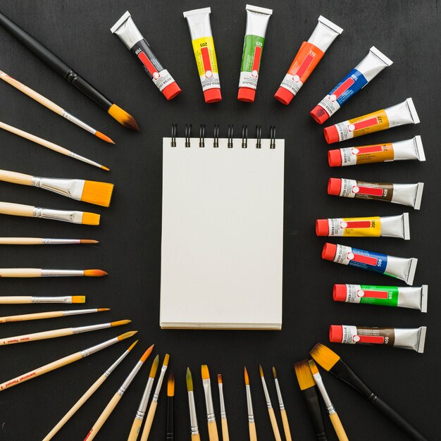 Materials for art lessons with notebook