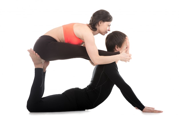 Mates doing balance exercises together