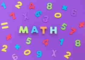 Free photo math word and colourful numbers flat lay