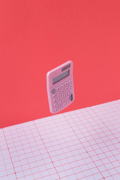 Free Photo maths arrangement with calculator floating