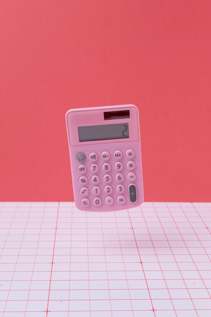 Free photo maths arrangement with calculator floating