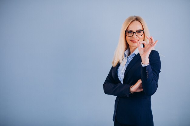 Mature businesswoman isolated in classy outfit