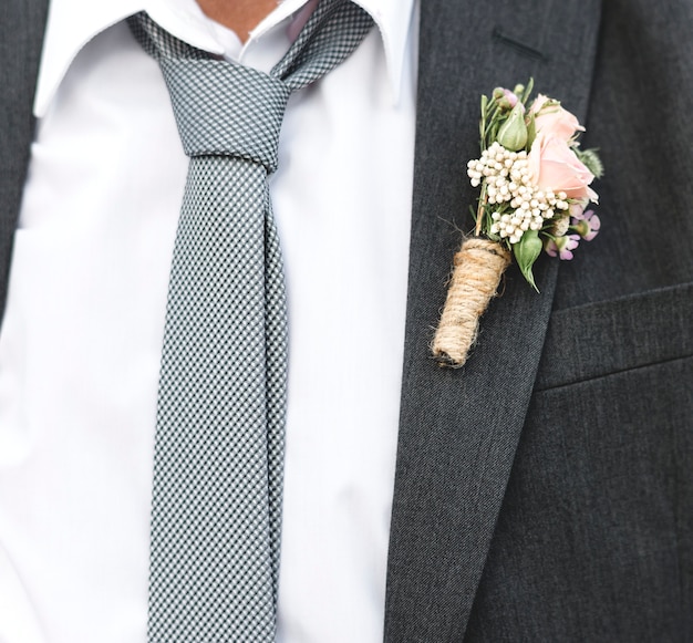 Free photo mature groom getting married at the beach