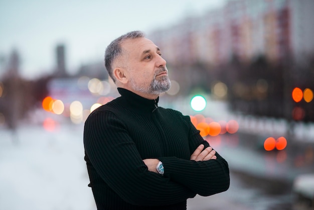 Mature man standing outside