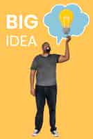 Free photo mature man with a big idea concept symbols