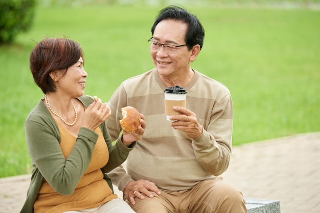 Mature Man And Woman In Love Having Date In Park