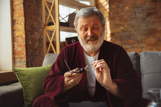 Mature senior older man during quarantine, realizing how important stay at home during virus outbreak