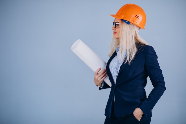 Mature woman architect in hardhat