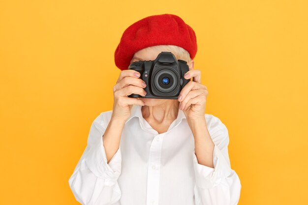 Mature woman making photo