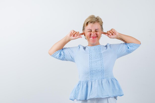 Mature woman posing in the studio