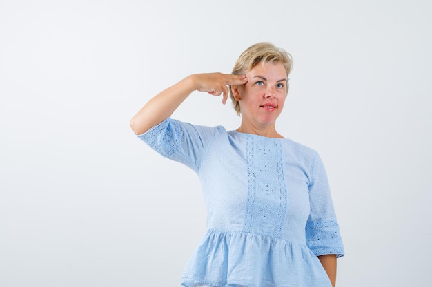 Mature woman posing in the studio