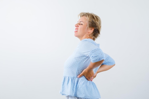 Mature woman posing in the studio