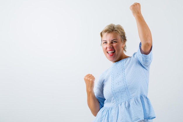 Free photo mature woman posing in the studio