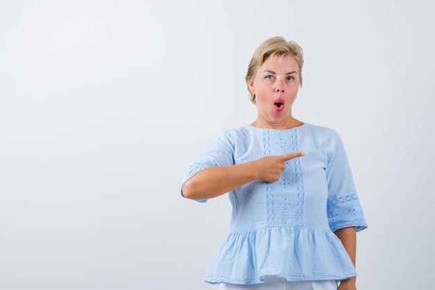 Mature woman posing in the studio