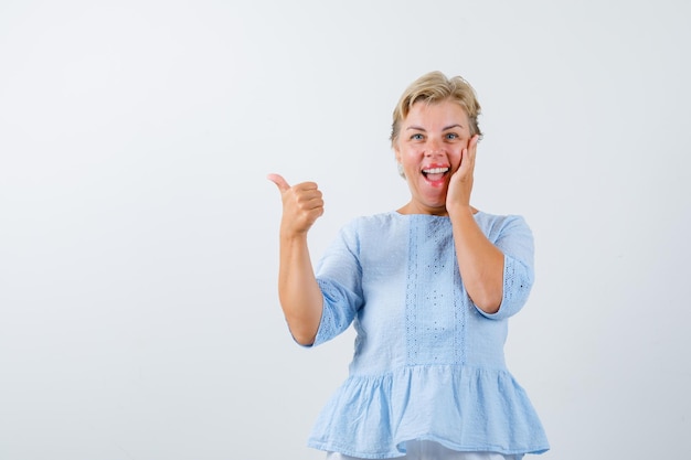 Mature woman posing in the studio