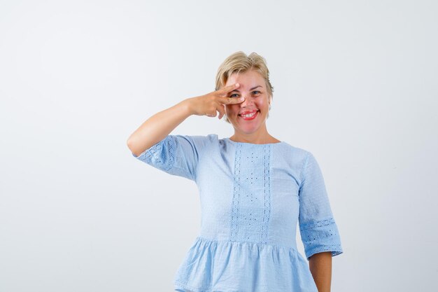 Mature woman posing in the studio