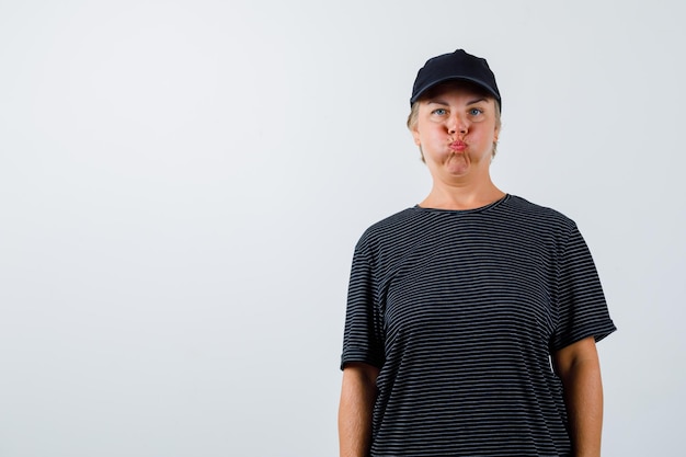 Mature woman posing in the studio