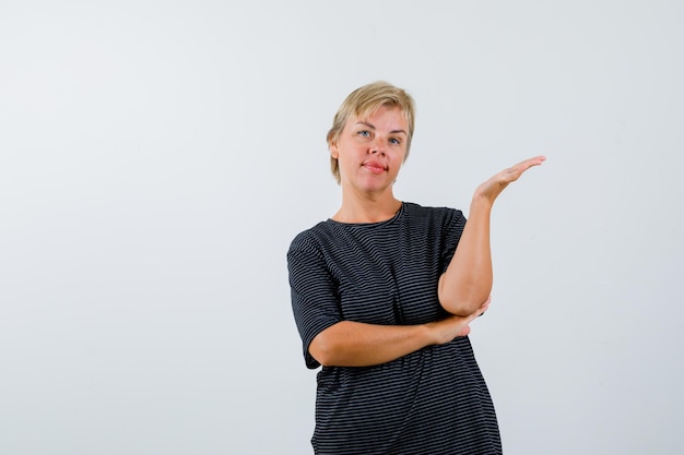 Mature woman posing in the studio