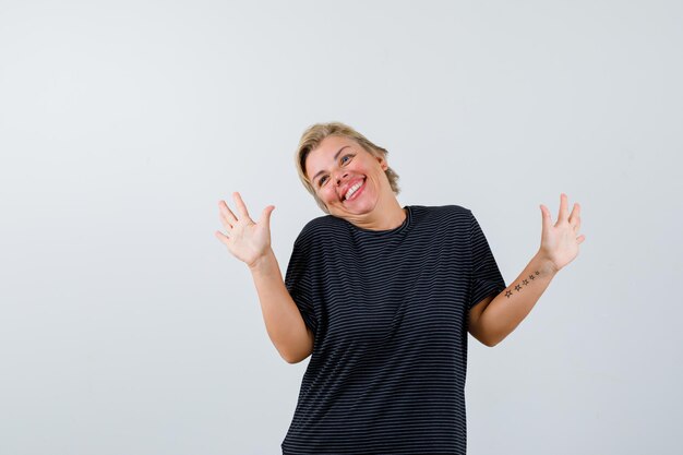 Mature woman posing in the studio