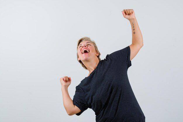 Free photo mature woman posing in the studio