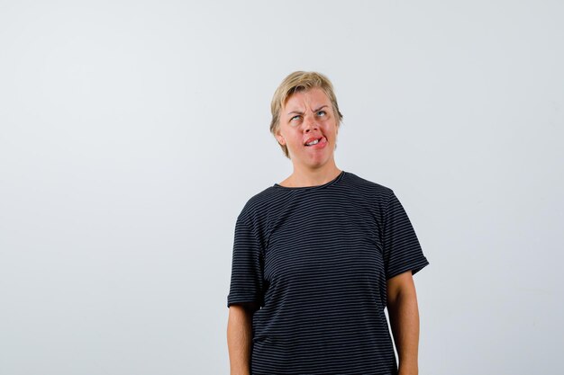 Mature woman posing in the studio