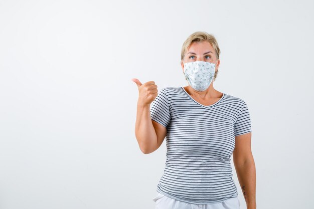 Mature woman posing in the studio