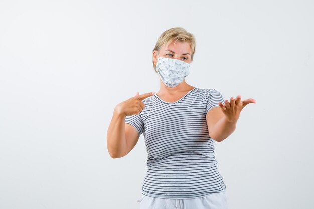 Mature woman posing in the studio