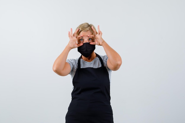 Mature woman posing in the studio