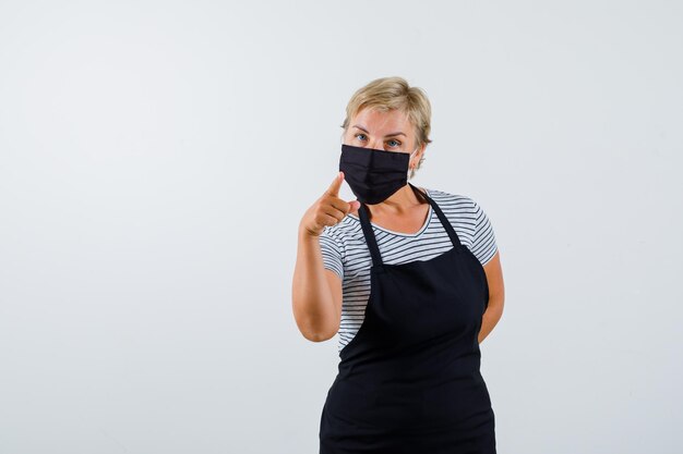 Mature woman posing in the studio